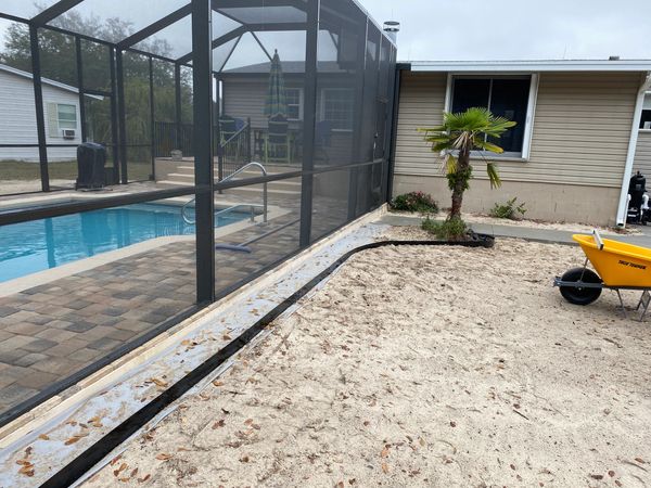 New landscape installation after pool construction.