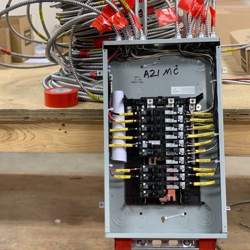 Electrical panel with wiring - indicating professional panel upgrade services