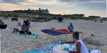 evening sound healing crystal bowl bath on the beach twilight yoga in Lavallette NJ shore brick