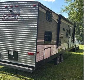 Towing a camper home from auction for a local customer