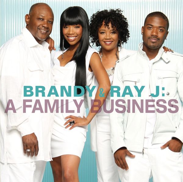 Her family wearing white suit and smiling are I am looking