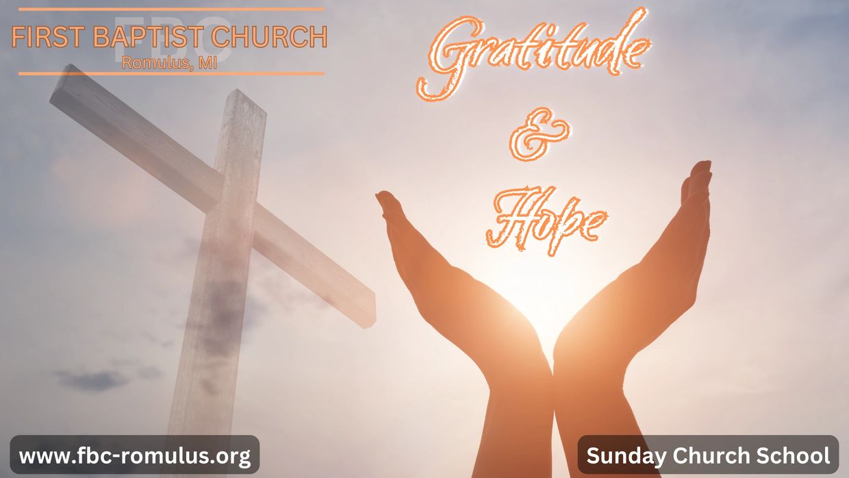 Hands raised toward sunlight beside a wooden cross, symbolizing gratitude and hope.