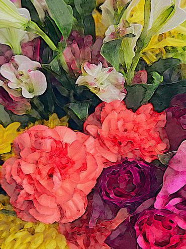 A bouquet of multi-colored flowers, pink, red, yellow, whte