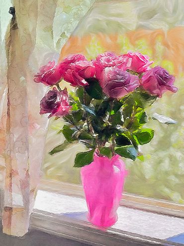 Bouquet of roses in a pink vase on a window sill