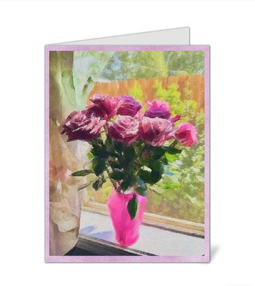 Bouquet of pink roses on a window sill