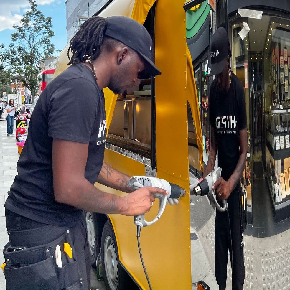 Hyped up wrapping a food truck in yellow satin vinyl