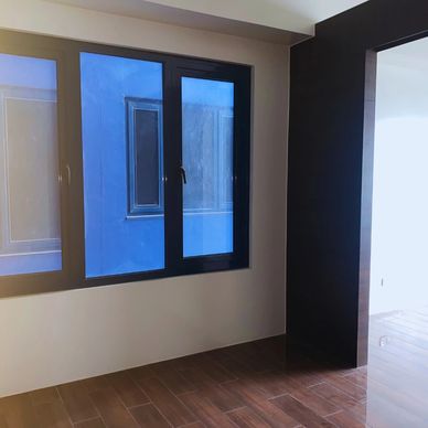 Glass window of Air Residences by the living area
