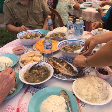 Tania Miletic photo - Shared meal following a workshop in Laos