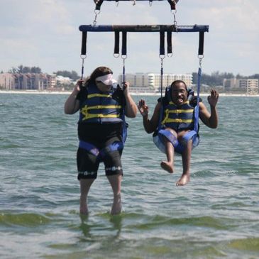 Lamar and Sandi parasailing in Florida 