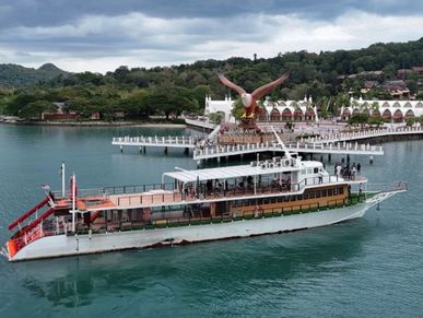 BP yacht cruising near Dataran Lang Langkawi, with the iconic eagle statue the background
