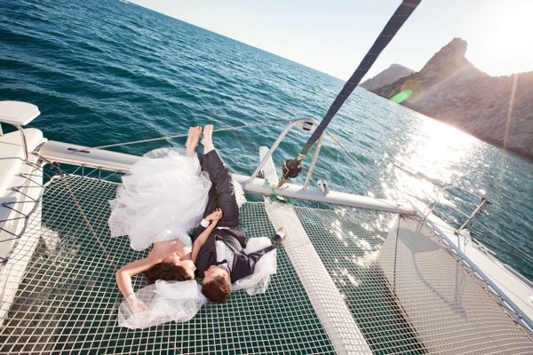 Just Married Couple Enjoying a Private Langkawi Honeymoon Cruise Aboard a Private Langkawi Yacht