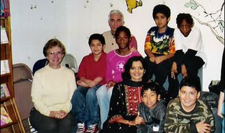Robert Arnett and Smita Turakhia with a group after India Slide presentation.