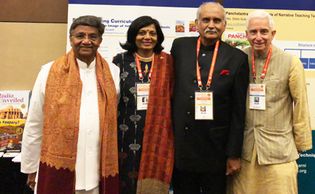 Robert Arnett and Smita Turakhia with Dr. Vinod Shah at a conference.