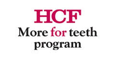 A 'HCF more for teeth' logo.