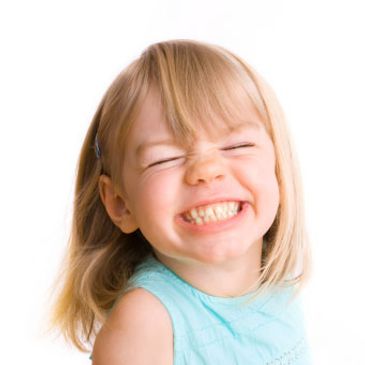 A very happy little patient at a children's dental visit at Jonathan Loughlin Dental.