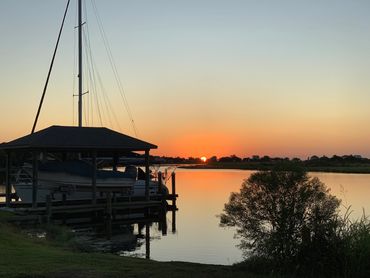 Sunset over Carr Drive in North Shore Beach.