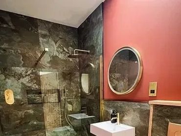 Colorful bathroom with walk in shower