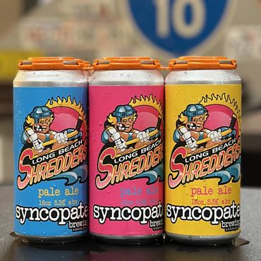 Three cans of Syncopated Long Beach Shredders pale ale
