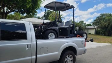Towing a golf cart to Palm Beach Polo