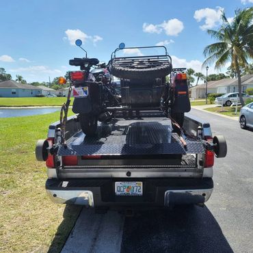 Towing a motorcycle with a side car