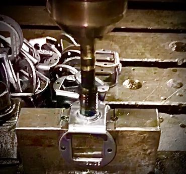 TAPPING AND MACHINING METAL PARTS