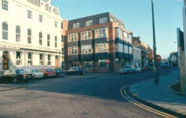 Westminster Bank, a modern looking building with red brick and large square windows.  1970s-80s