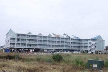 Hurricane storm damage to condominium building