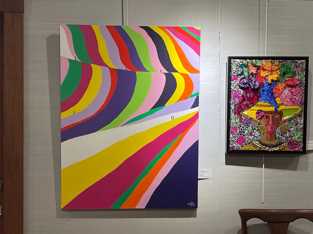 Two vibrant paintings featuring colorful abstract waves and a floral hat portrait.