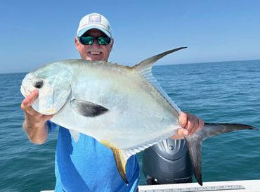 March Madness............beautiful Permit caught offshore today with Capt Tom