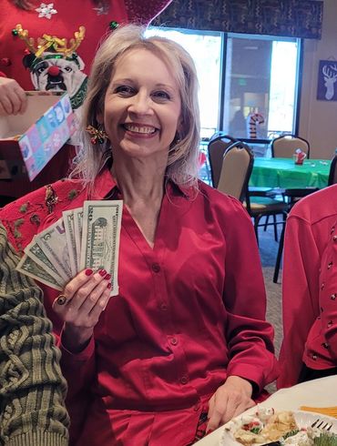 Closeup shot of woman holding dollars cash