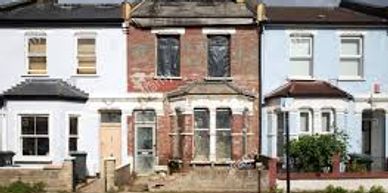 Picture of a ran down terraced house. A bridging loan can be used to renovate neighbouring property