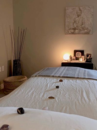 Reiki bed prepared with crystals on it.
