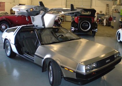 original Delorean DMC-12 with gull wing doors and shining stainless steel.