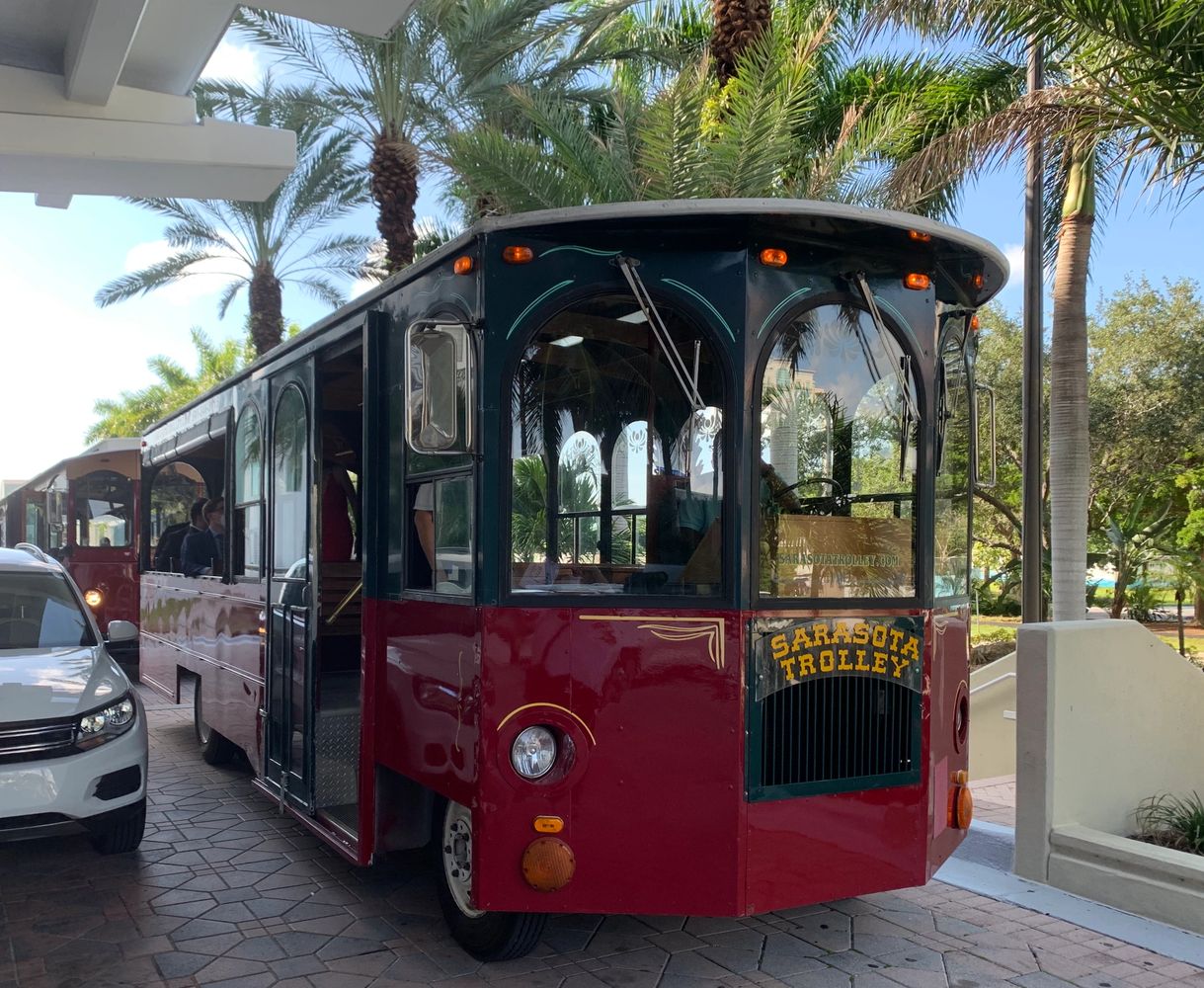 Vintage Style Open-air Trolley, 34 passenger capacity, brass & wood interior.