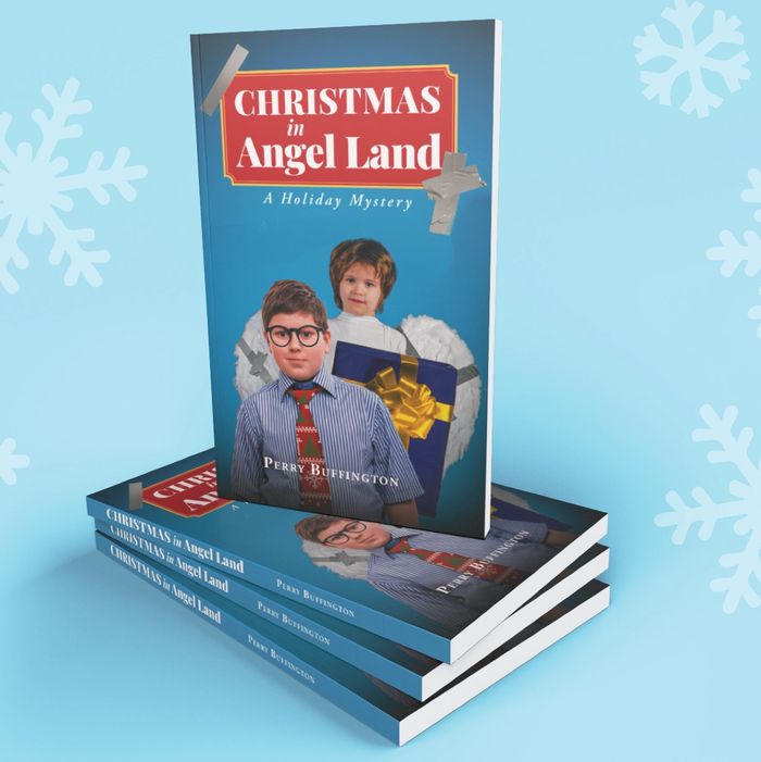 Stack of copies of the book Christmas in Angel Land.