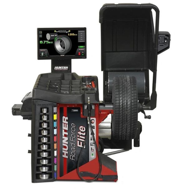 Hunter Road Force Elite tire balancing machine with monitor and tire mounted.