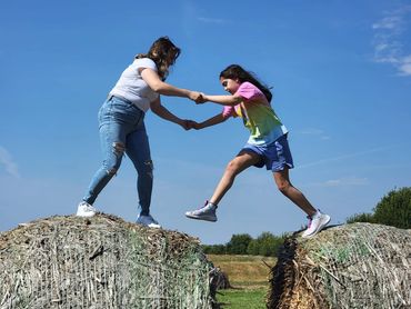 jumping on hay bales