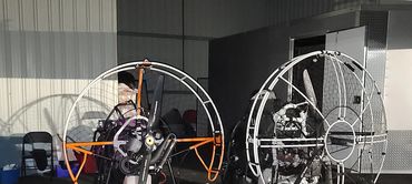 Two powered paragliders for training at Marker Inbound. Powered paragliding instruction available.