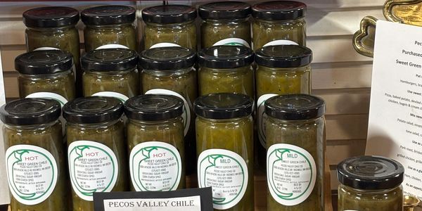 Jars of hot and mild sweet green chile from Pecos Valley Chile.