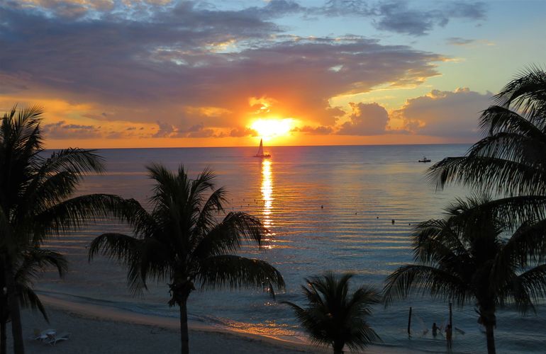 Sunset from the Sky Bar at Secrets Aura Cozumel Resort and Spa