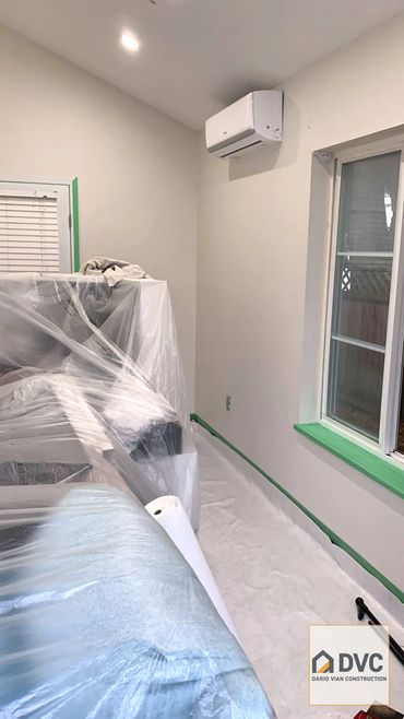 Professional floor protection and clean job site setup during renovation in Delta