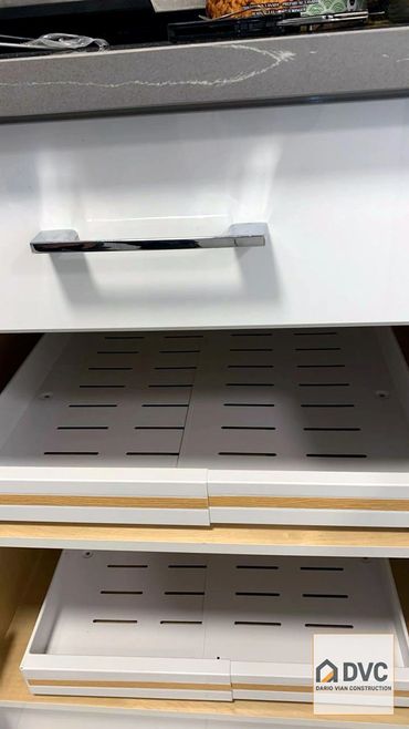 Pull-out cabinet organizer installation in Richmond for easy kitchen storage access