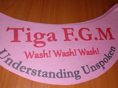 Pink cloth with text about understanding and washing.