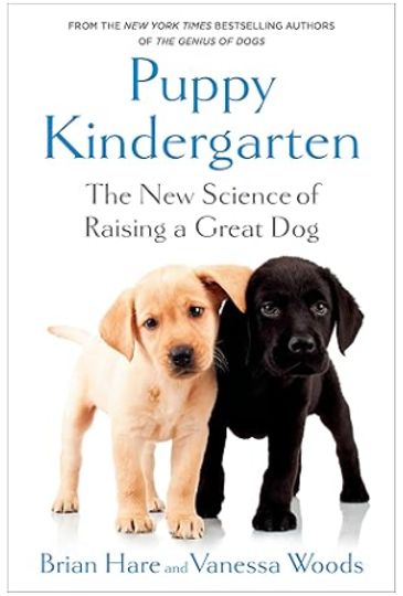 Book cover featuring two puppies and title about raising great dogs.