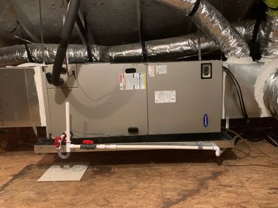 Completed Handing Air Handler and Furnace in an Attic