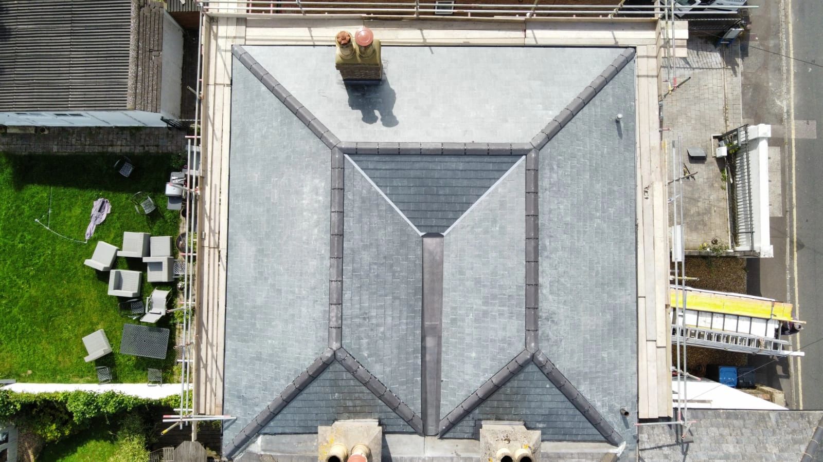 Slate roof by Divine Roofing Services