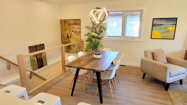 Open-concept space,seamlessly connecting the downstairs area,kitchen and living room.