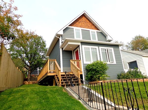 Beautiful Ramsay construction exterior renovation project. Hardie Siding, New Windows, New Deck.