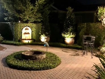 Gorgeous courtyard highlighting fountain and pots