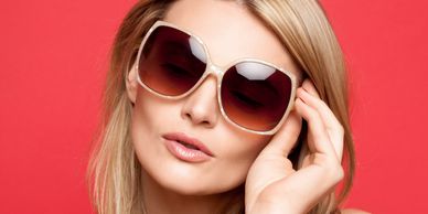 Woman after face-driven image consulting and personal color analysis. Eyewear consultation.